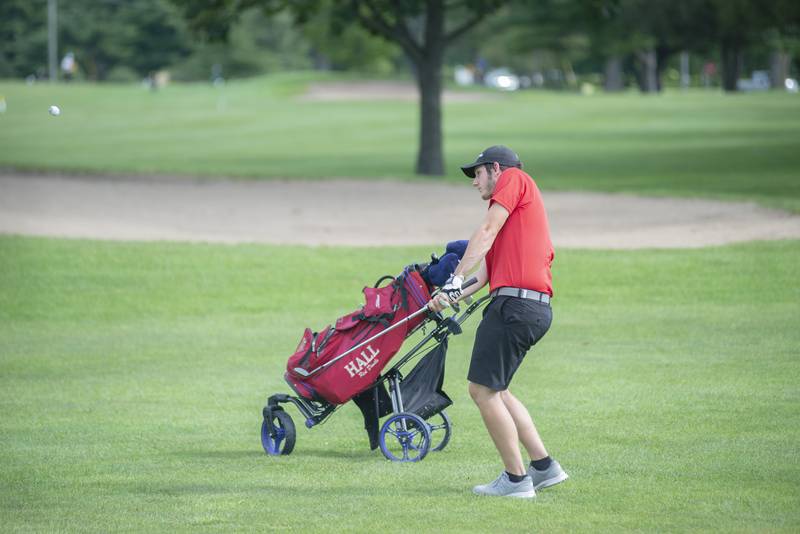 Hall’s Domonic Galetti chips towards the #10 green in Rock Falls Saturday, Sept. 3, 2022.