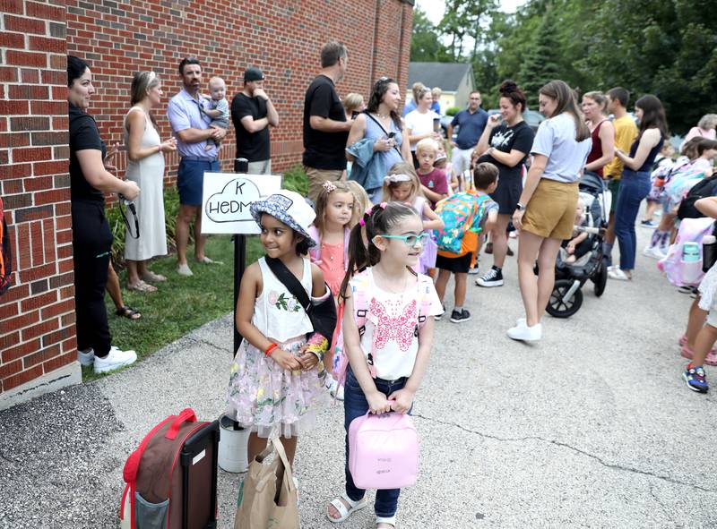 Students line up for the first day of school at Whittier Elementary School in Downers Grove on Friday, Aug. 25, 2023.