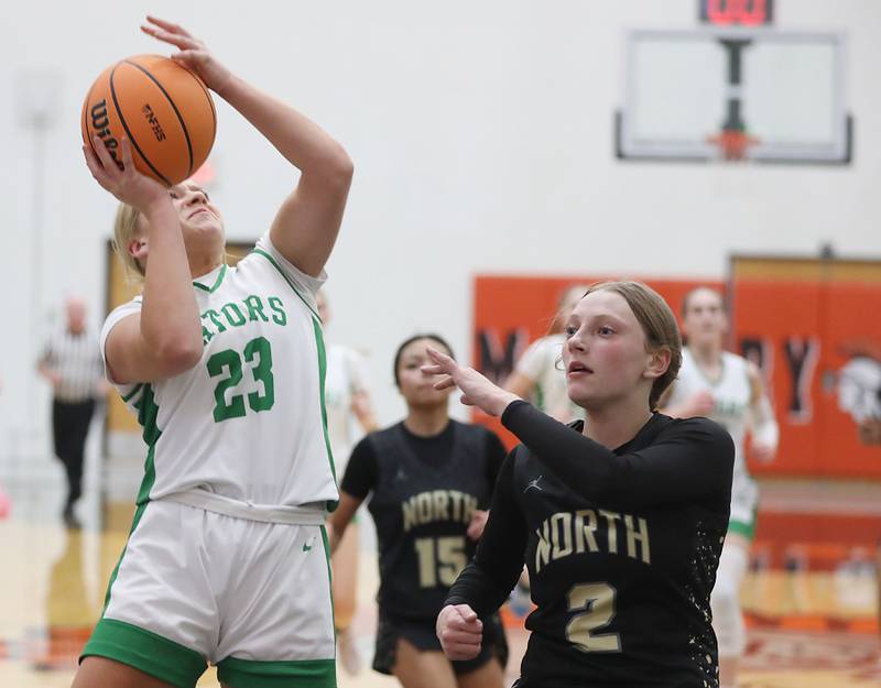 Crystal Lake South's Laken LePage shoots the ball in front of Grayslake North's Ashlyn Stoneham during a Northern Illinois Holiday Classic semifinal girl basketball game on Tuesday, Dec. 16, 2025, at McHenry High School.