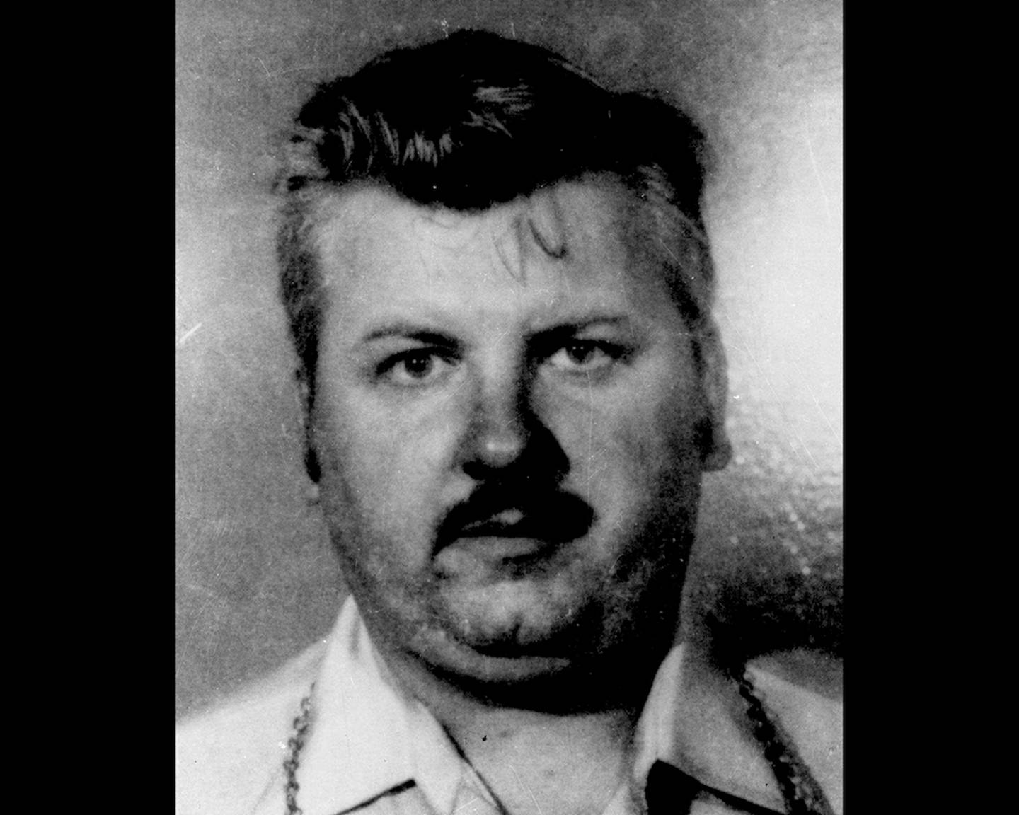 FILE - This 1978 file photo shows serial killer John Wayne Gacy. The case of John Wayne Gacy has helped authorities solve another slaying, one that he didnít commit. The Cook County Sheriffís Office is scheduled to announce Wednesday, April 23, 2014, they have identified the remains found in a forest preserve in 2008 as those of 22-year-old Edward Beaudion of Chicago. Beaudion was identified after his relatives came forward to submit DNA samples as part of the effort to identify several of Gacyís 1970s victims. Authorities believe Missouri resident Jerry Jackson killed Beaudion in 1978. But without a body at the time, they never charged him. Jackson died last year at age 62.