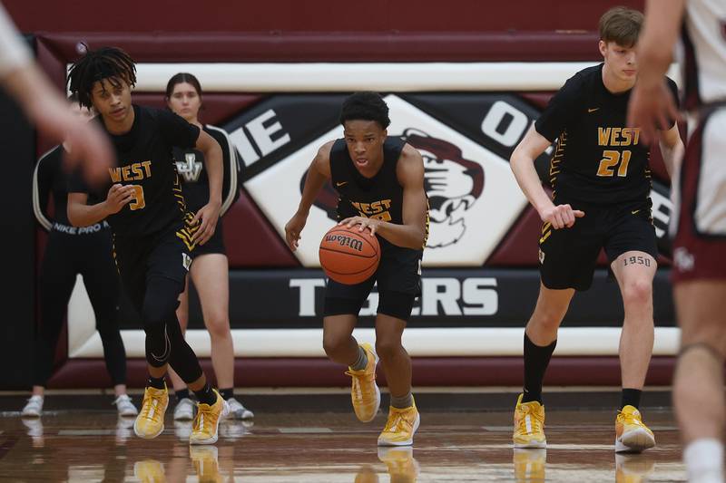 Joliet West’s Zion Gross takes the ball upcourt against Plainfield North on Friday, Dec.15th, 2023 in Plainfield.