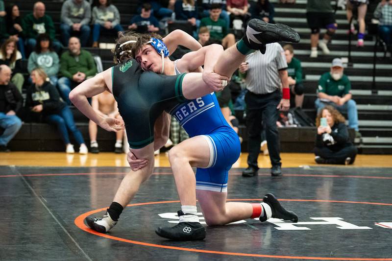 Princeton senior Preston Arkels gets a leg up on his man in Saturday's Class 1A Sandwich Regional. He won first place at 167 pounds, one of five regional champions for the Tigers.