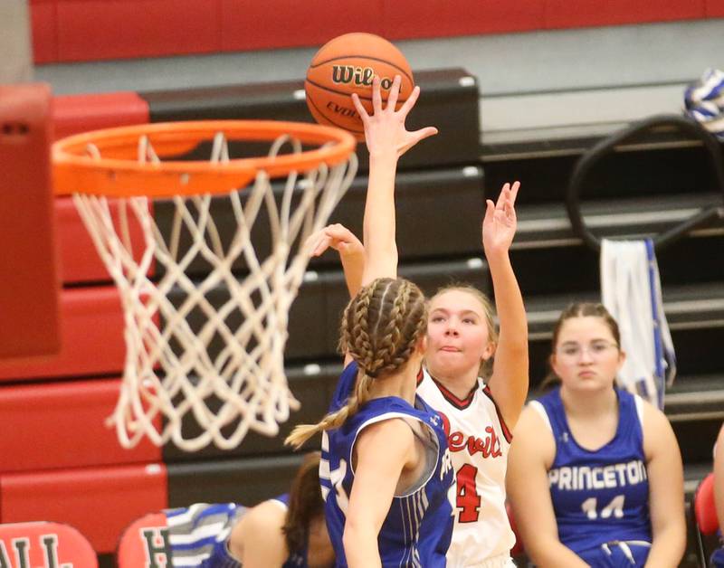 Hall's Charlie Pellegrini shoots a shot over Princeton's Keighley Davis on Thursday, Nov. 30, 2023 at Hall High School.