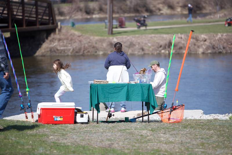 Families check out fishing demo at Clark Island Recreation area on Saturday, April 12, 2025 in Batavia.