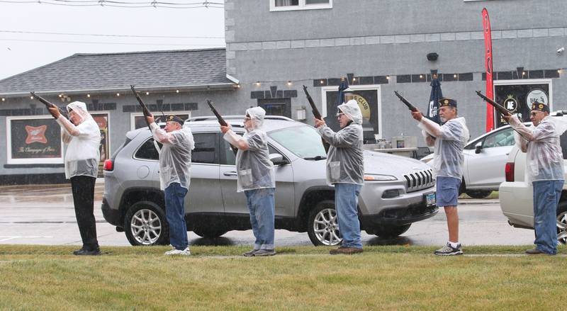 Ladd veterans fire guns during a memorial service remembering lives lost on September 11, 2001 on Monday Sept. 11, 2023 at Veterans Park in Ladd.