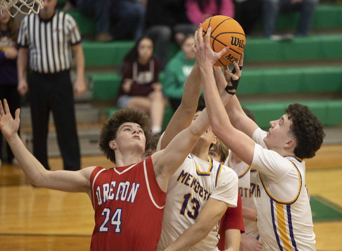 Oregon’s Ethan Peeling works against Mendota’s Drew Becker Friday, Feb. 27, 2026, at the Class 2A Rock Falls boys basketball regional.