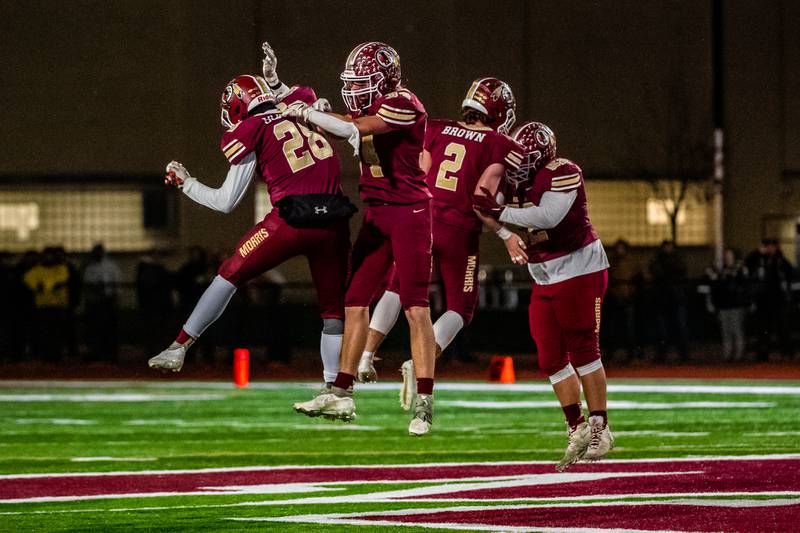 Morris celebrate winning the IHSA Quarterfinals game against Mahomet-Seymour Saturday Nov. 12, 2022 at Morris High School