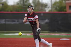 Yorkville’s Bella Rosauer, Oswego’s Jaelynn Anthony clutch in relief as game suspended in the 12th, tied 3-3