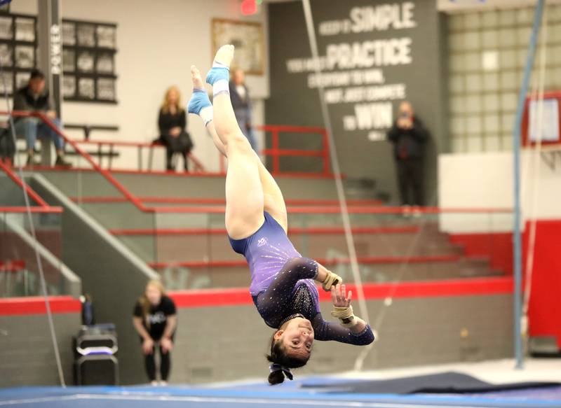 Downers Grove Co-op’s Genevieve Herion competes on the floor exercise during the Hinsdale Central Sectional on Monday, Feb. 10, 2025 in Hinsdale.