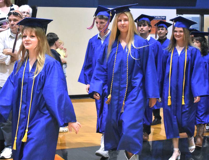 Genoa-Kingston graduates enter the gym Sunday, May 17, 2026, during the commencment ceremony at Genoa-Kingston High School.