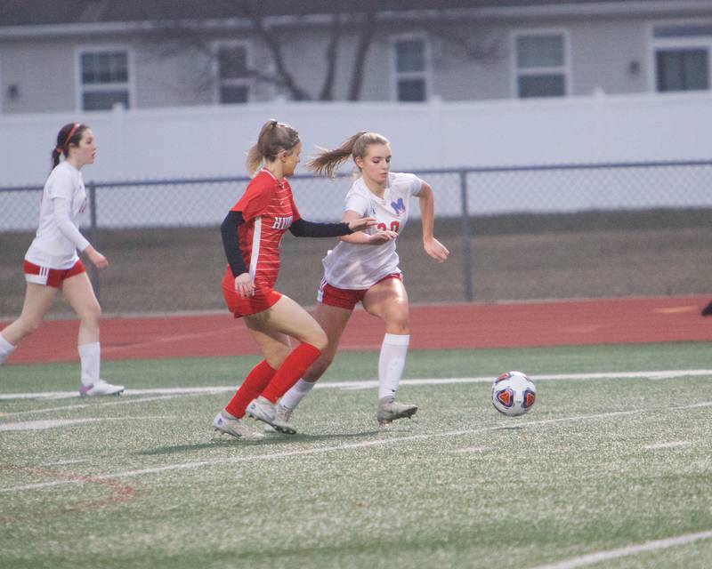 Huntley's Brooke Maxedon battles for the ball with Marion Central's Adriana on Wednesday March 22, 2023 in Huntley.