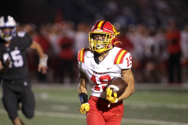 Batavia’s Zach Granberg carries the ball during a game at St. Charles North on Friday, Sept. 15, 2023.