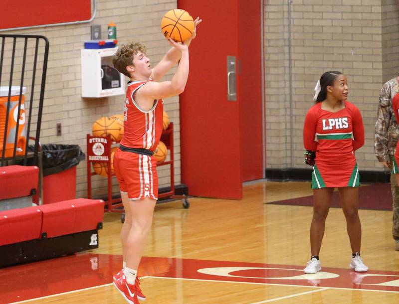 Streator's Isaiah Weibel shoots a wide-open three point shot against L-P during the Dean Riley Shootin' The Rock Thanksgiving Tournament on Monday, Nov. 25, 2024 in Kingman Gym at Ottawa High School.