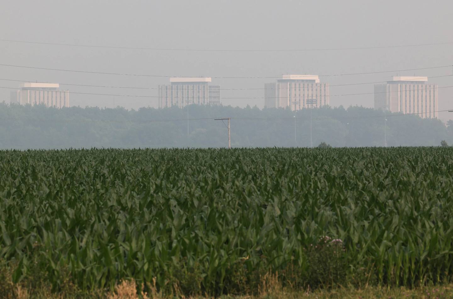 Some of the buildings at Northern Illinois University are obscured by the haze from the Canadian wildfires Tuesday, June 27, 2023, in DeKalb. Smoke from the fires in Canada has moved south into Illinois causing poor air quality that may be unhealthy especially to those with sensitive respiratory systems.