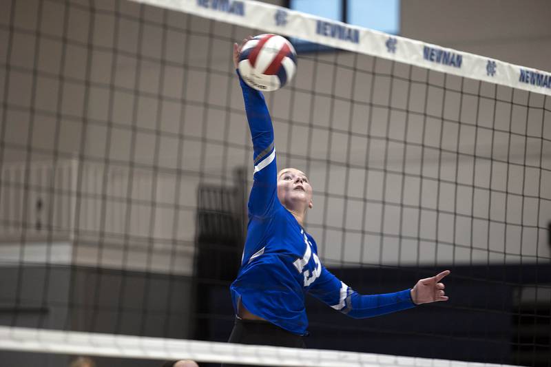 Newman’s Kennedi Shippert hammers a shot against Kewanee Tuesday, Sept. 16, 2025.
