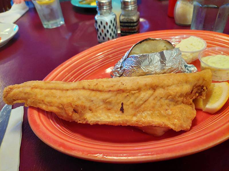 The fried walleye features a light, non-greasy breading and comes with a side of baked potato at Softails Bar and Grill in Ladd.