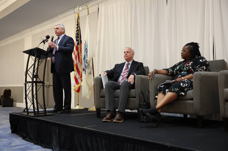 Mayor Bob O’Dekirk answers a question as candidate’s Terry D’Arcy and Tycee Bell wait to answer the same question at the Joliet Mayoral Candidate Panel luncheon hosted by the Joliet Region Chamber of Commerce on Wednesday, March 8th, 2023 at the Clarion Hotel & Convention Center Joliet.