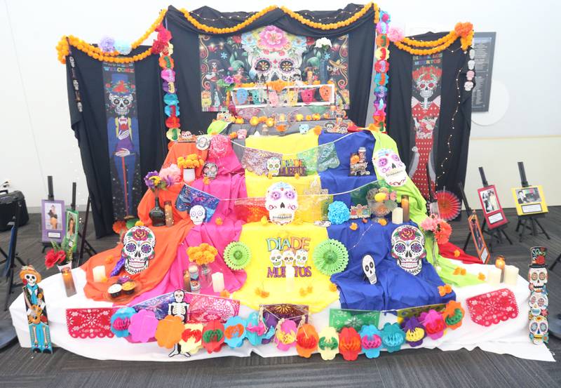 A cultural tribute to departed loved ones is on display on Friday, Sept. 26, 2025 at Illinois Valley Community College’s Main Campus and Ottawa Center lobbies. The Celebration of Día de los Muertos is widely observed in Mexico Nov. 1-2, part of a 3,000-year-old tradition paying respects and remembering friends and family members who have died. Central to the festive tribute are decorative and brightly colored altars and memorials covered in flowers, photos, keepsakes and candles. 

The public can furnish personal tributes to the IVCC display, which continues through Nov. 1. Photos, keepsakes or offerings of non-perishable foods and sealed drinks (to provide nourishment and enrichment for those who are gone) can be added to the display. Families can also leave notes or written memories.

 When the event is over, contributed items can be picked up at the Main Campus and Ottawa Center front desks beginning at 1 p.m. Nov. 3. The event is sponsored by the Hispanic Leadership Team, The Illinois Valley Visual Arts Club, The Project Success Leadership Team and the International Club.