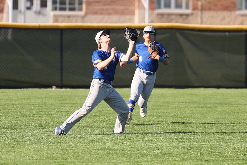 Joliet Central’s Vai Stulga pulls in the fly ball against Joliet West on Monday, April 15, 2024.