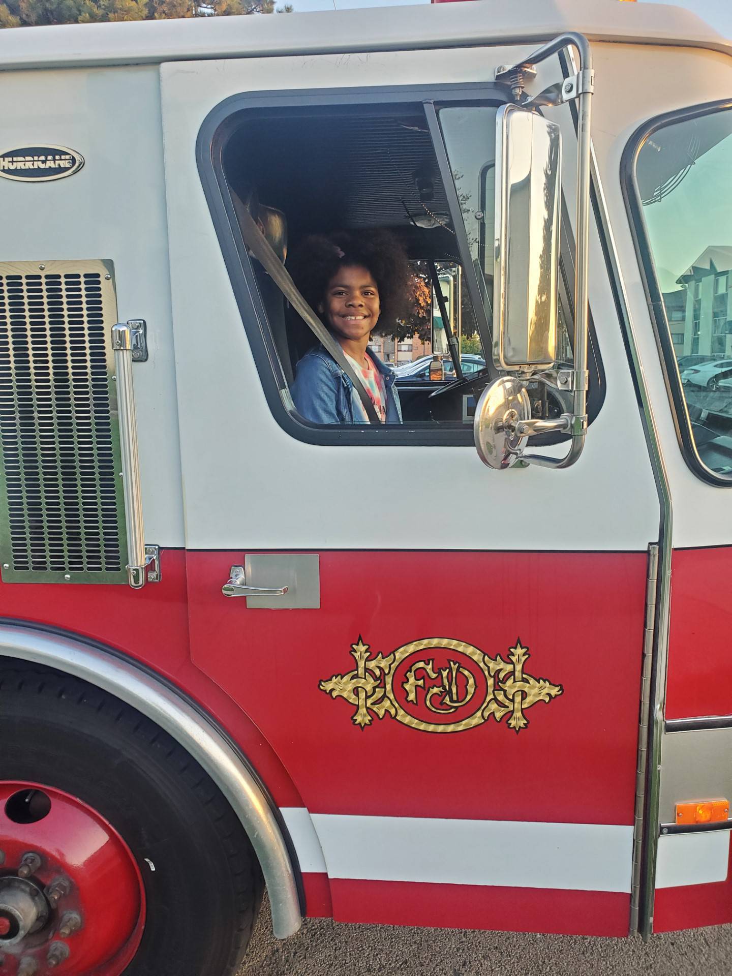Sasha Davenport, 8, of Joliet rode to school on a Joliet Fire Department fire truck on Monday, Oct. 2, 2023. The Joliet City Center Partnership offered the contest as part of its Kidz Fest on Aug. 5.