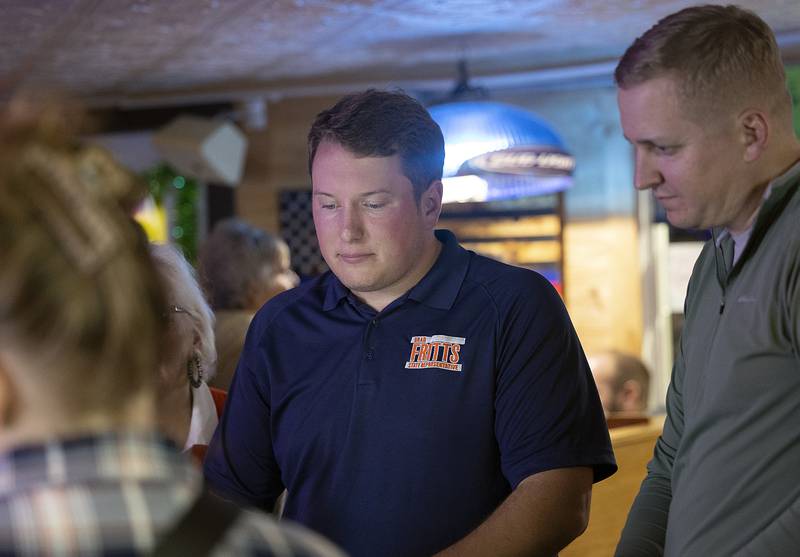 74th district incumbent Brad Fritts (left) and Tom Demmer look over the numbers for race Tuesday, Nov. 5, 2024. Fritts is facing off against Democrat David Simpson.