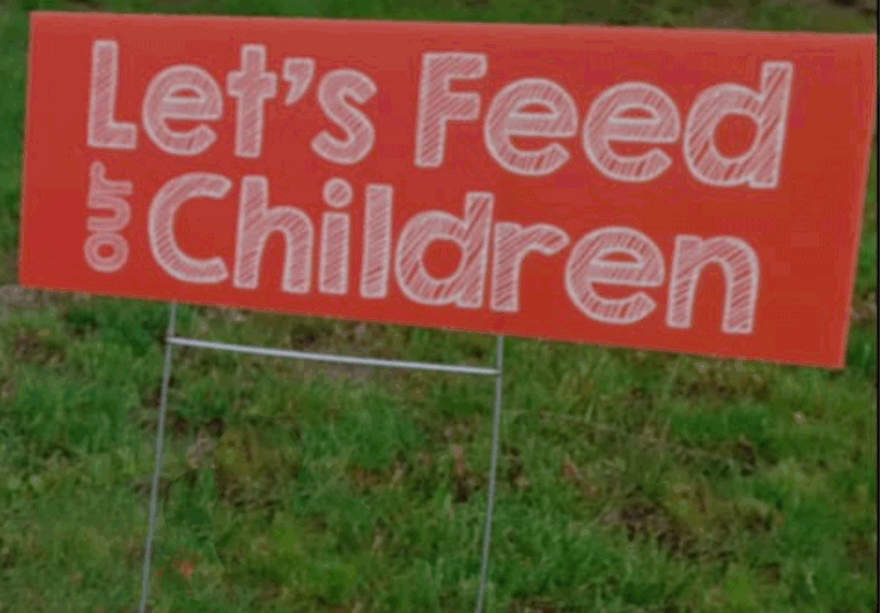 “Let’s Feed Our Children” program sign