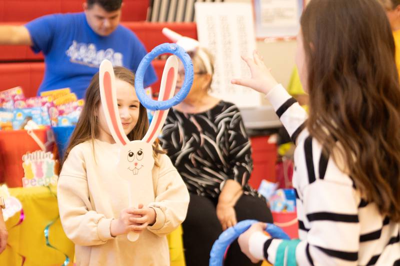 Children play games at the annual Easter Egg hunt on Saturday, April 12, 2025 at Hall High School in Spring Valley.