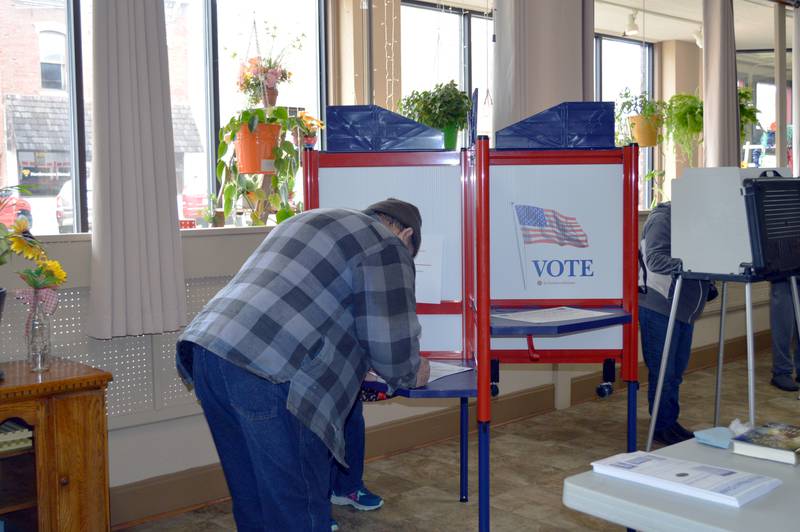 Allan Wooden fills out his ballot for the consolidated election in the Polo Area Senior Center on April 4, 2023. About 173 people had voted in the precinct as of 2:35 p.m.