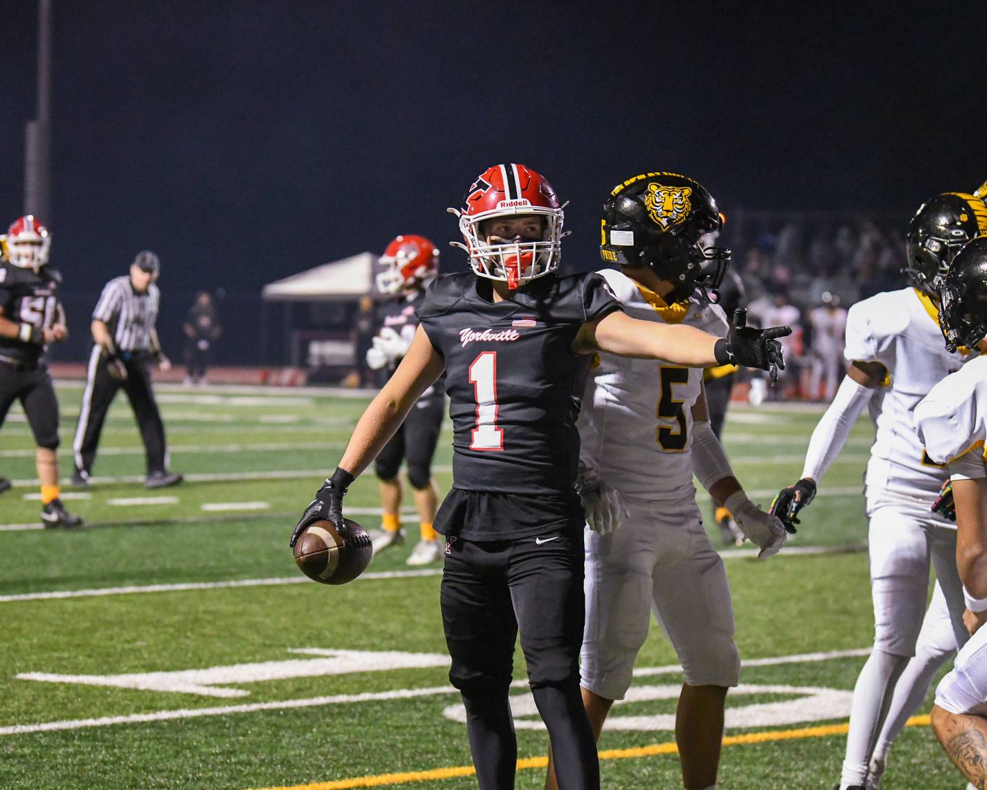 Yorkville's Colton Spychalski (1) celebrates his first down during the game against Joliet West on Friday Sept. 5, 2025, held at Yorkville High School.
