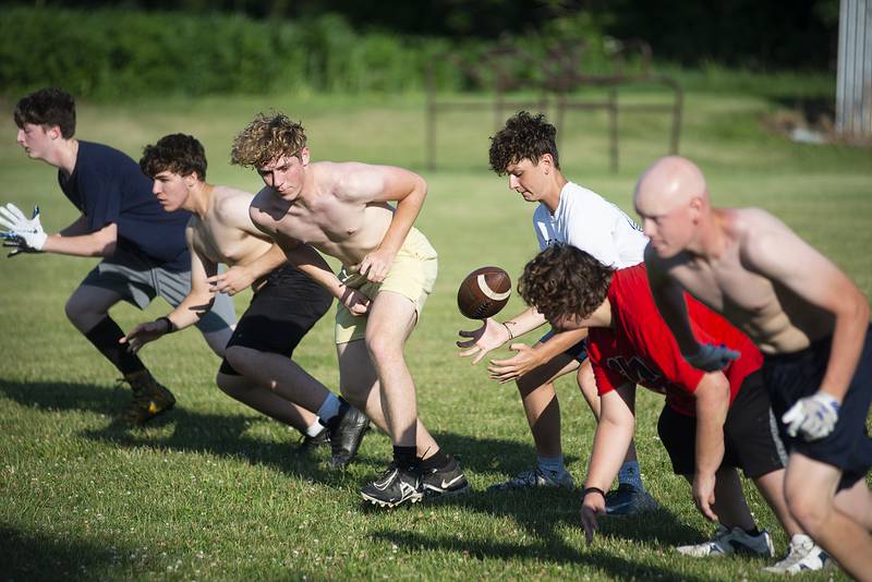 Polo players run through drills Thursday, July 7, 2022 during football camp. The Marcos are coming off their second eight-man state title in 3 years.