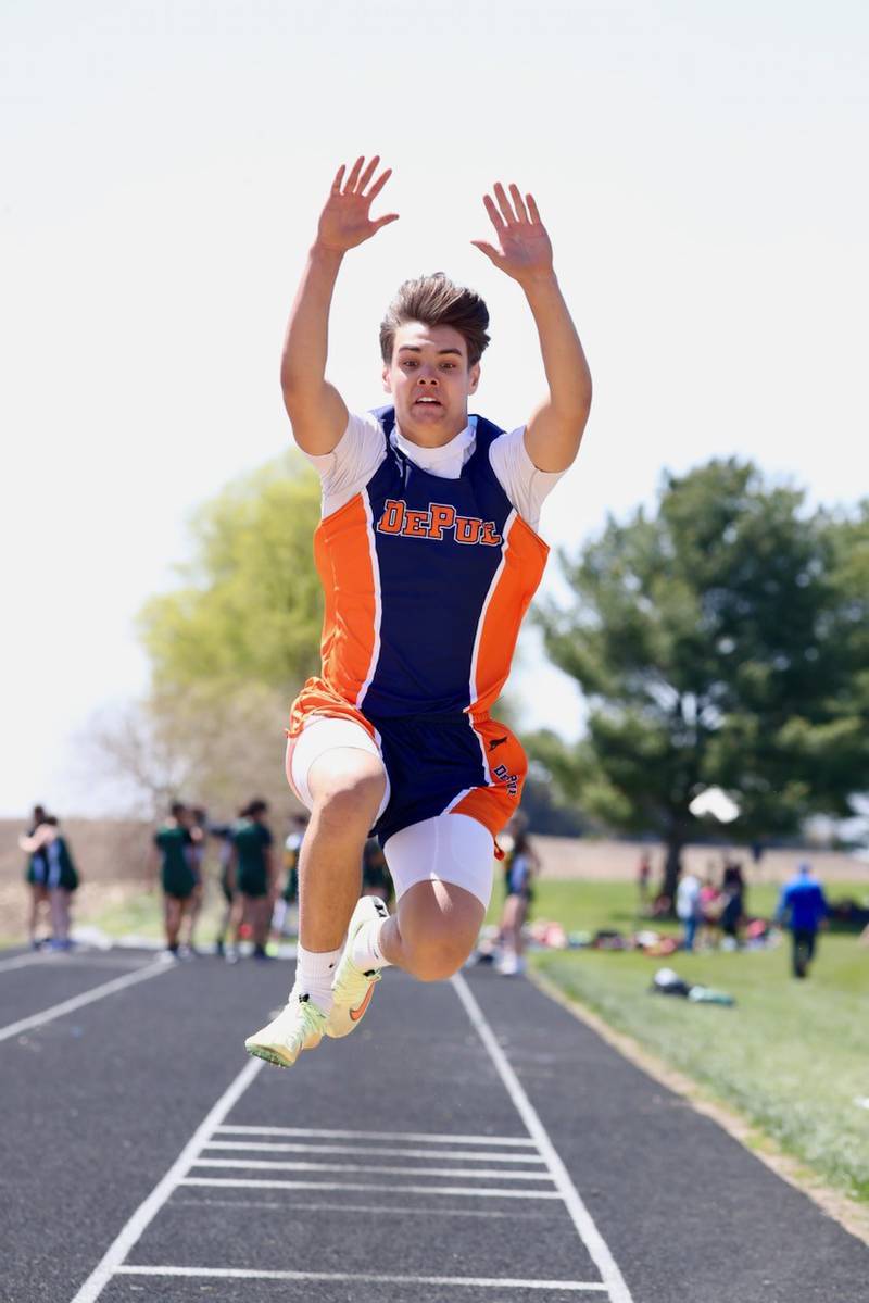DePue's Landon Marquez soars in the 8th grade long jump during Thursday's Bureau County Junior High track meet.
