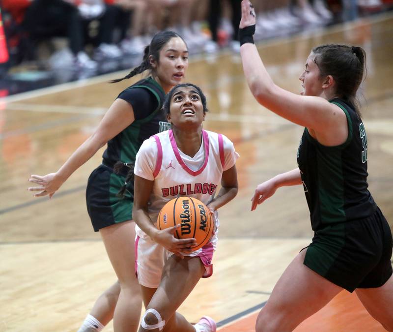 Batavia's Julia Arulandu looks for an opening during the Class 4A St. Charles East Sectional final against Glenbard West on Thursday, Feb. 27, 2025 in St. Charles.