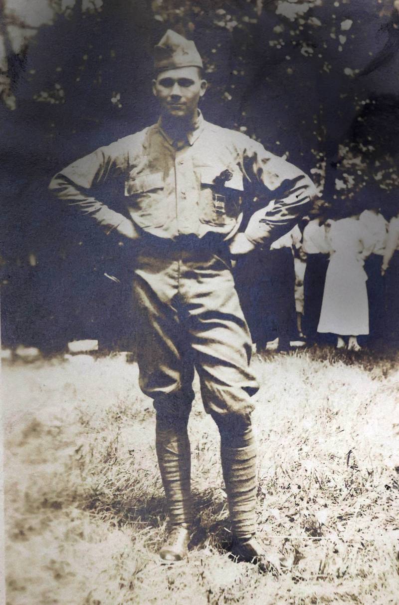 A photo of WWI U.S. Army soldier Albert Leonhard inside a service record book that was purchased by DeKalb resident John Wright at a local estate sale.