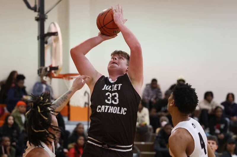 Joliet Catholic’s Anthony Birsa puts up the shot against Prespectives in the Class 2A Julian Sectional championship on Friday, March 3rd, 2023 in Chicago.