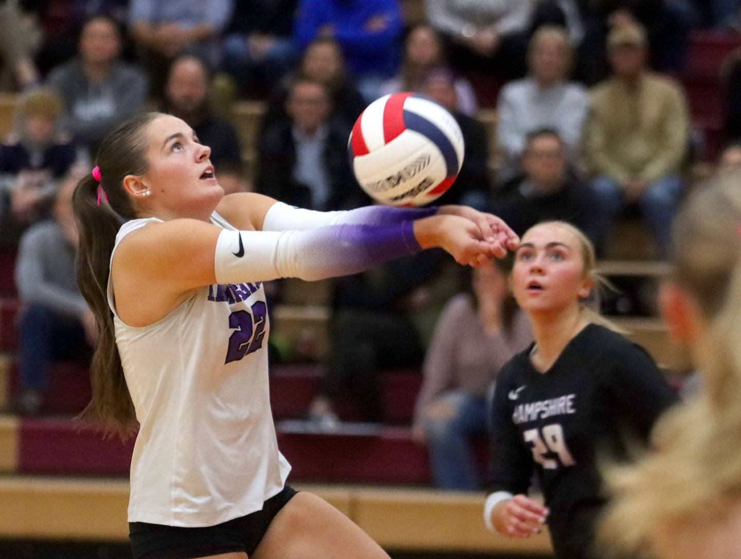 Hampshire’s Kylie Lambert passes the ball in girls varsity volleyball at Huntley High School on Thursday, October 23, 2025.
