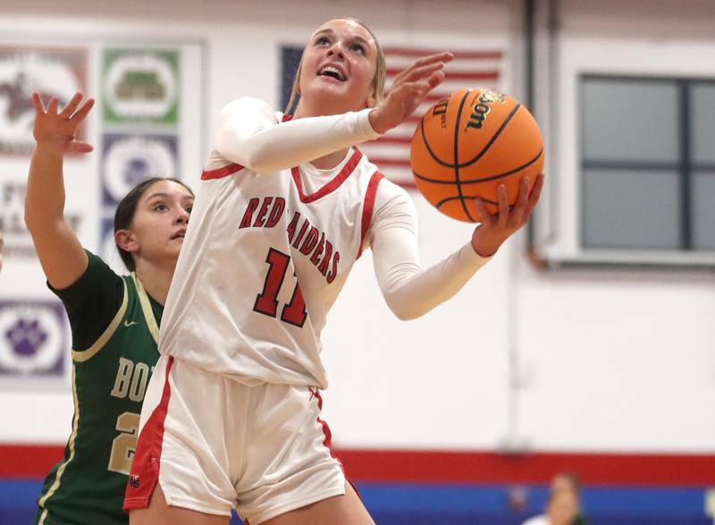 Huntley’s Anna Campanelli moves under the hoop against Rockford Boylan during varsity girls basketball on Friday, Nov. 22, 2024 at Dundee-Crown High School in Carpentersville.