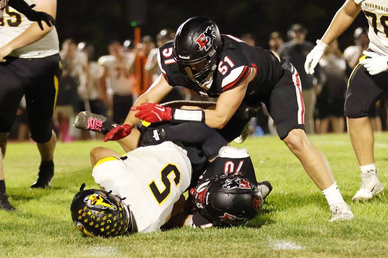 Erie-Prophetstown Panther John Holland sacks Riverdale Rams quarterback Abram Krier Friday, Oct. 3, 2025 in Erie for EP's homecoming game.