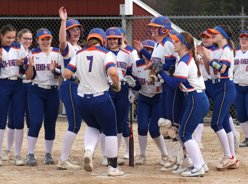 Genoa-Kingston’s Elizabeth Davis is greeted at the plate after homering during their game against Indian Creek Tuesday, March 18, 2025, at Indian Creek High School in Shabbona.