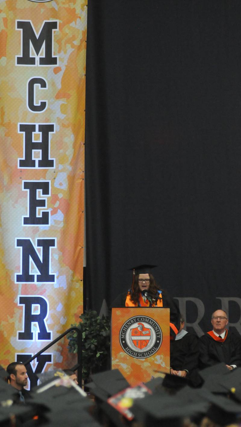 Sarah Doherty speaks Saturday, May 21, 2022, during the McHenry High School’s 102nd Commencement Ceremony in the gym of the school’s Upper Campus. The ceremony was moved inside and split into two ceremonies because of the rainy weather.