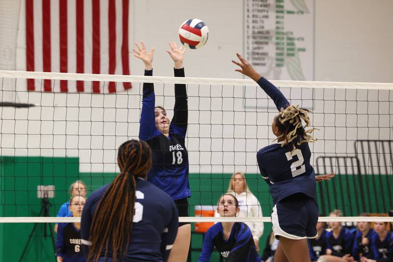 Clifton Central's Maddie Webb jumps to block a tip by Grace Christian's Zoey Baldridge during Grace Christian's victory in two sets, 25-20, 25-16, in the IHSA Class 1A Dwight Regional quarterfinals on Monday, Oct. 27, 2025.
