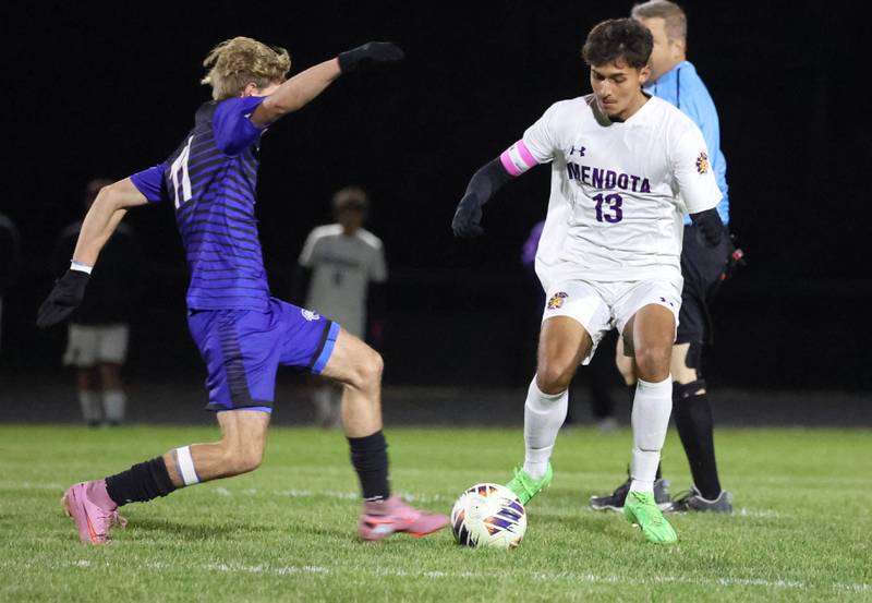 Harvest-Westminster's Elijah Schultze (left) and Mendota's Sebastian Carlos fight for possession Friday, Oct. 31, 2025, during the Class 1A Indian Creek Sectional championship game Friday in Waterman.