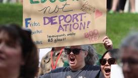 Photos: Dozens gather at NIU to rally in support of international students and staff