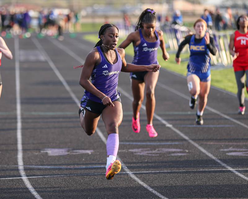 Plano's Armoney Clay wins in the 100 meters at the Field of Dreams Plano Invitational.  April 21, 2023.