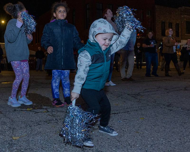 Oliver Hoffman dances as Harmonix performs at Frosty on First on Friday, November 7, 2025 on First Street in La Salle.