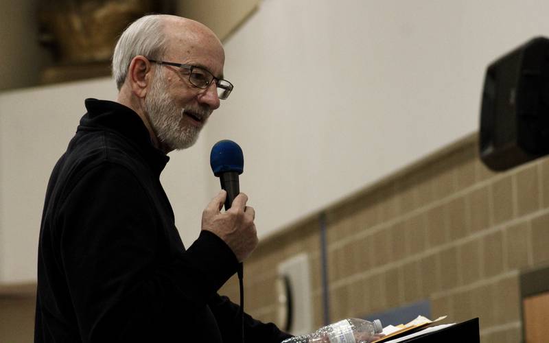 Dixon's resident wordsmith and historian Tom Wadsworth served as moderator during the championship of the Stupor Bowl trivia contest Saturday, Feb. 11, 2023, at Reagan Middle School in Dixon.