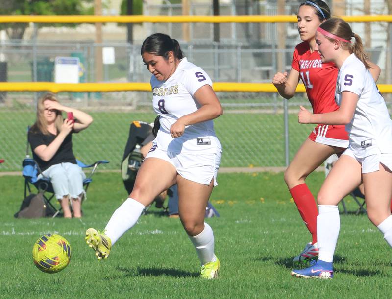 Serena/Newark/Earlville's Emma Hernandez kicks the ball ahead of Streator's Briana Chavez on Thursday, April 16, 2026 at the James Street Recreational Complex in Streator.