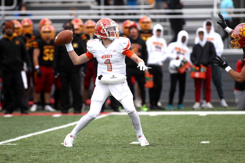 Hersey quarterback Colton Gumino looks to throw the ball during their Class 7A second-round playoff game in Batavia on Saturday, Nov. 5, 2022.