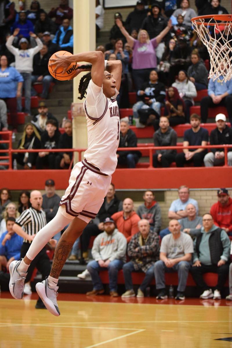 Kankakee's Lincoln Williams elevates for a dunk during the Kays' IHSA Class 3A Ottawa Sectional semifinal against East Peoria Wednesday, March 4, 2026.