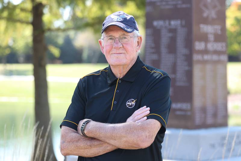 Micheal Collins, Air Force veteran, stands near one of the memorials in Plainfield on Thursday, Oct. 10, 2024.