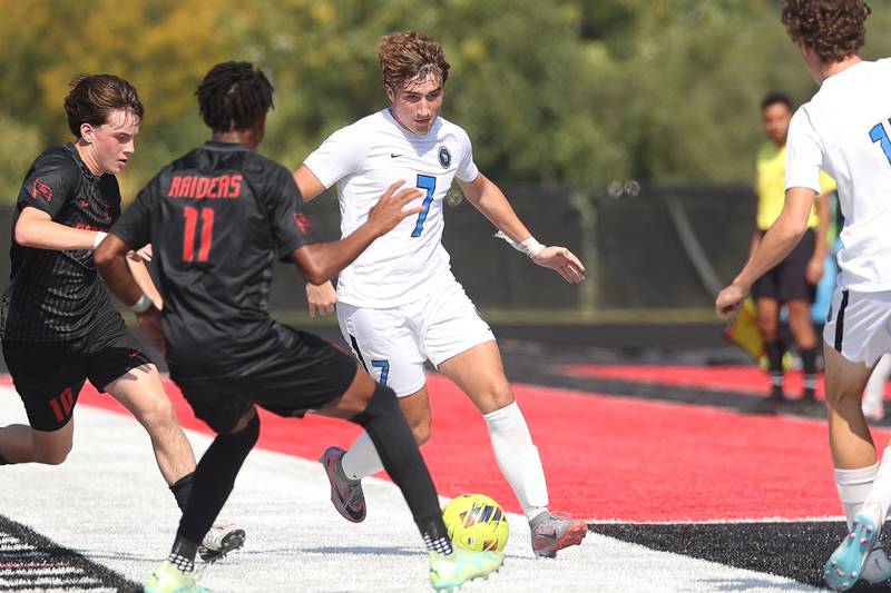 Lincoln-Way East’s Cole Powell works the ball along the sideline against Bolingbrook on Saturday, Sept. 30, 2023 in Bolingbrook.